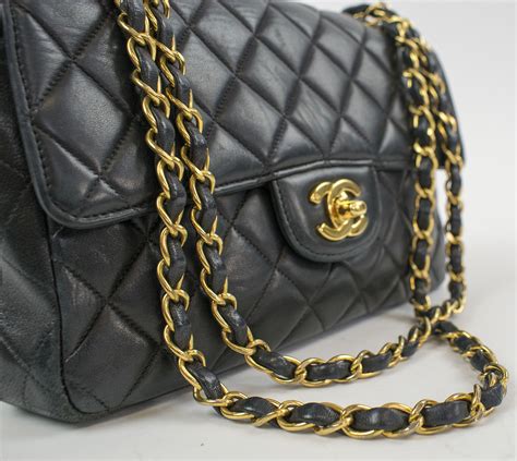 chanel gold and silver chain bag|Chanel handbags with chain straps.